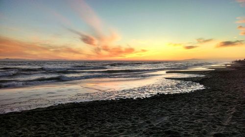 Scenic view of sea at sunset