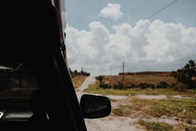 Close-up of car on side-view mirror