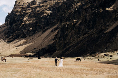 Group of people on mountain road