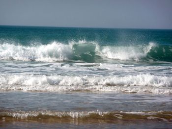 Scenic view of sea against clear sky