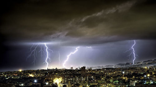 Lightning in sky over city