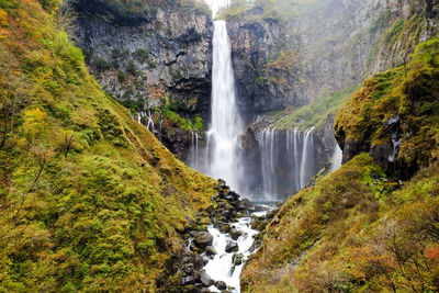 Scenic view of waterfall in forest