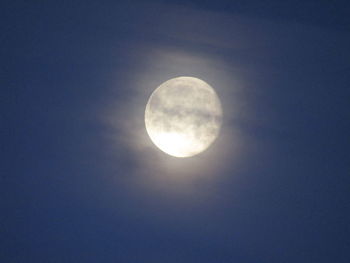 Low angle view of moon against sky at night