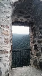 Scenic view of sea against sky seen through window