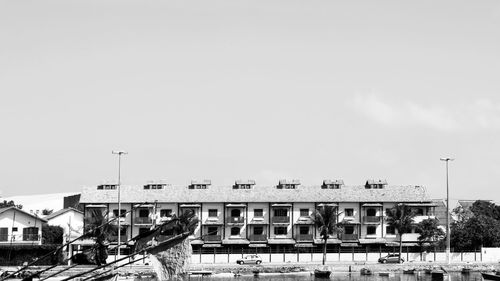 Houses against sky in city