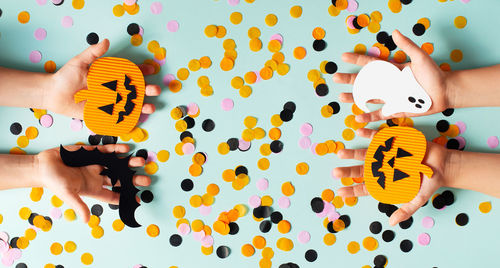 High angle view of people with hands