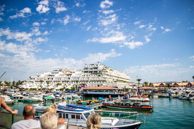 Boats moored in city