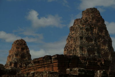 Low angle view of old ruin building against sky