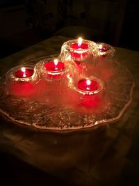 High angle view of illuminated candles