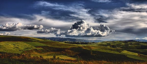 Scenic view of landscape with dramatic sky