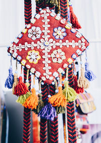 Close-up of multi colored decorations hanging in shop