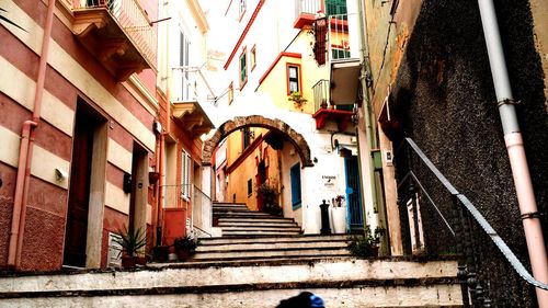 Narrow alley with buildings in background