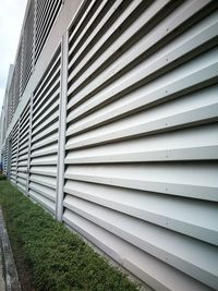 Tilt image of building against sky