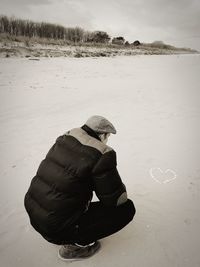 Man in hat during winter