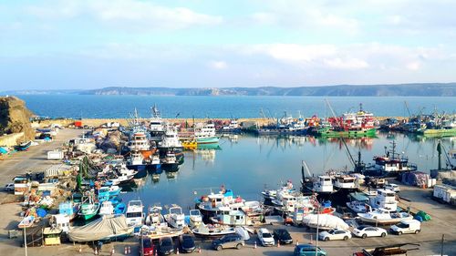 High angle view of boats moored in harbor