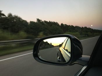 Road seen through car windshield