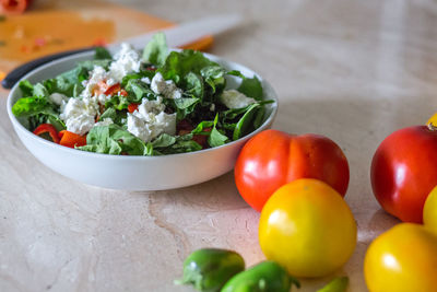 Close-up of vegetables salad in bowl on table