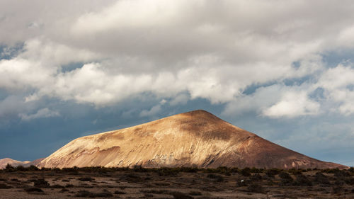 Scenic view of desert against sky