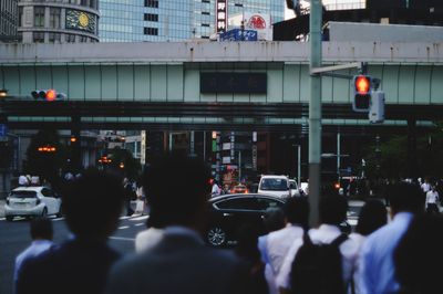 People walking on street in city