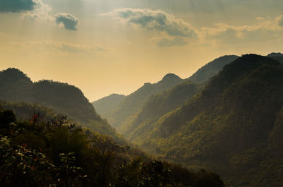 Scenic view of mountains against sky during sunset