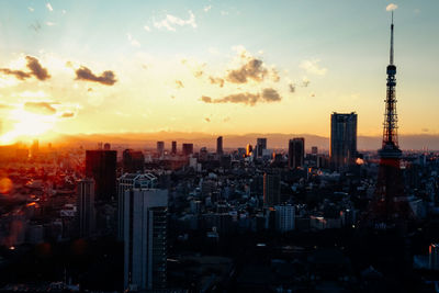 High angle view of cityscape and tokyo tower during sunset