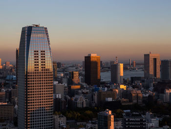 City lit up at dusk