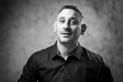 Black and white portrait of a man in a shirt