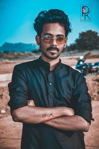 Portrait of young man wearing sunglasses