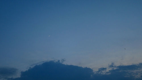 Low angle view of moon in sky