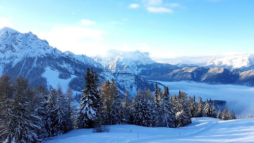 Scenic view of snow covered mountains