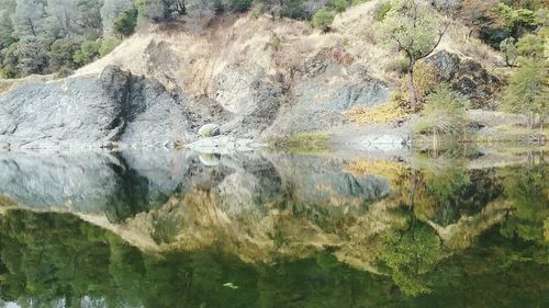 Close-up of rocks in lake