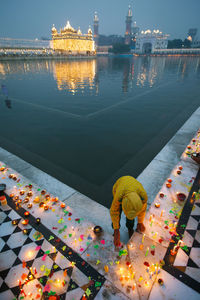 Swimming pool in water against sky