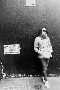 Woman standing on road