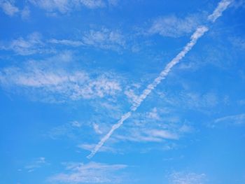 Low angle view of vapor trail in sky