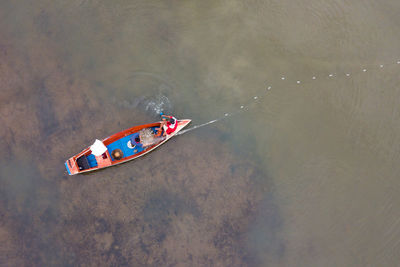 High angle view of man in boat on lake
