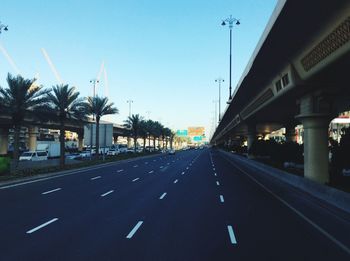 Road in city against clear sky