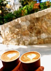 Close-up of cappuccino on table