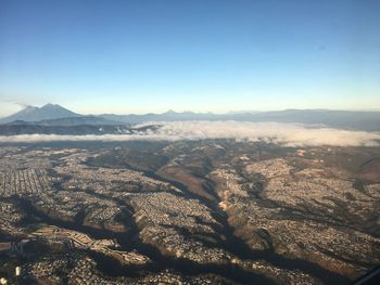 Aerial view of landscape against clear sky