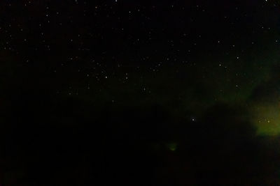 Low angle view of stars in sky at night