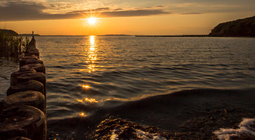 Scenic view of sea against sky during sunset