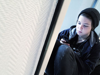 Teenage girl using mobile phone