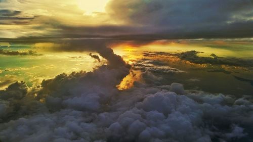 Scenic view of landscape against cloudy sky