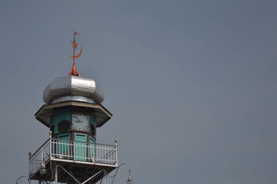 Low angle view of lighthouse against clear sky