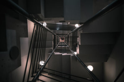 Directly below shot of illuminated staircase in building