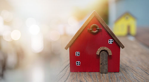 Close-up of red toy on wood