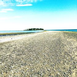 Scenic view of beach against clear sky