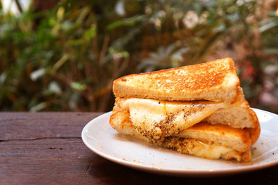 Close-up of bread in plate on table