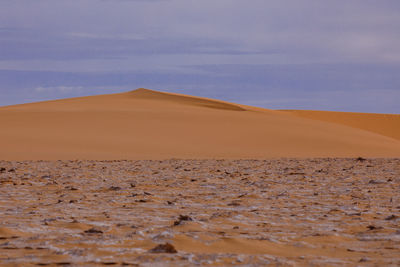 Scenic view of desert against sky