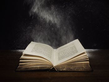 Close-up of open book on table