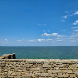 View of the sea and sky from the old stone wall of the fortress